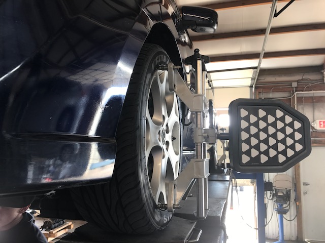 Car being aligned at American &amp; Import Auto Repair in Johnson City, TN